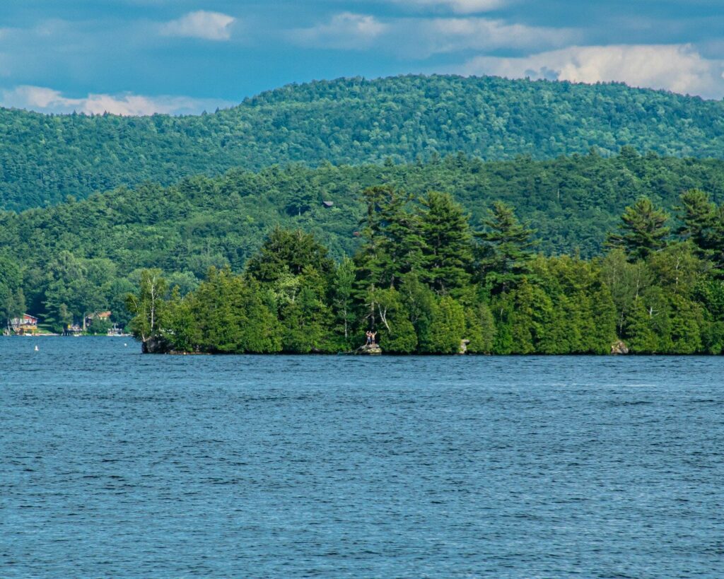 Lake George; green trees near body of water during daytime